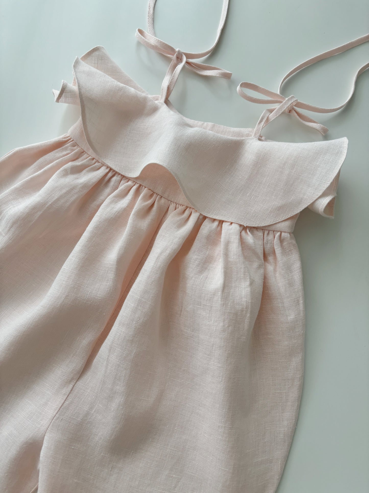 Baby linen ruffle playsuit PALE PINK